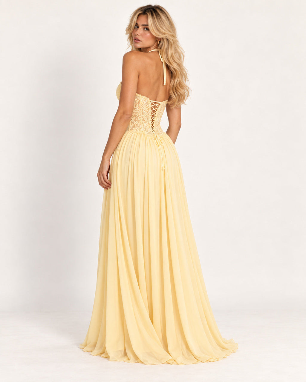 Marlowe Pleated Halter Maxi Dress — Yellow (back view) — studio photograph