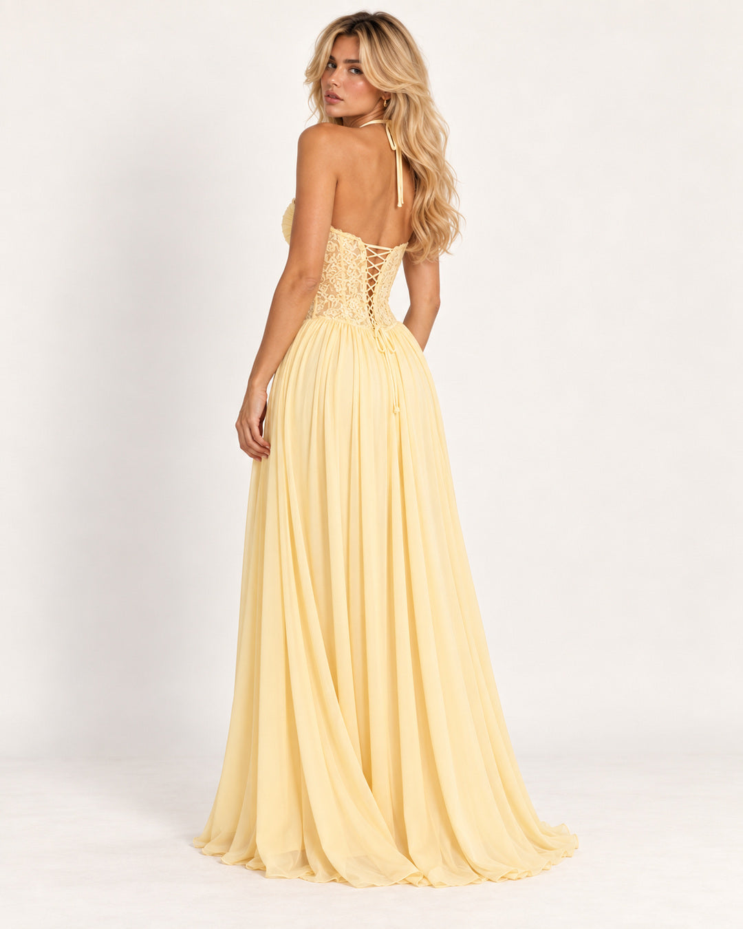 Marlowe Pleated Halter Maxi Dress — Yellow (back view) — studio photograph